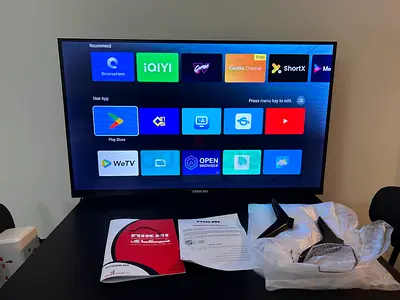 Smart LED TV with stand and manuals - working condition