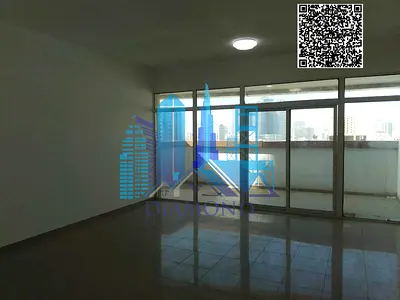 For annual rent, a ready-to-move-in apartment with two rooms and a large hall, open view, in Horizon Towers, Ajman.