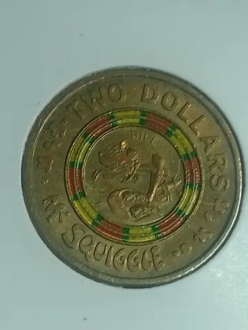 My two-dollar collectible coin with colorful center (circulated)