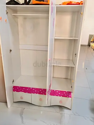 wardrobe with hanging rail, shelves and drawers