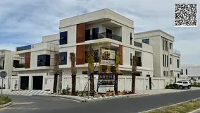 Villa for sale in one of the most prestigious areas of Ajman. Two floors, roof, and swimming pool. P
