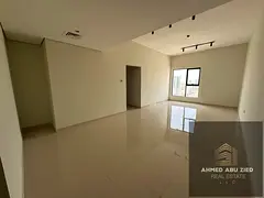 For rent in Ajman Al Rashidiya 1, brand new 2BR apartment with hall, 2 baths, super deluxe finish, s