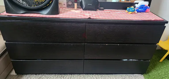 My black 6-drawer dresser - sturdy storage with minor wear