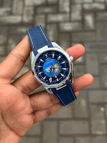 Omega mens blue-dial world-timer watch with blue rubber strap
