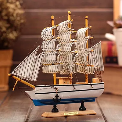 Handmade, wooden sailboat model