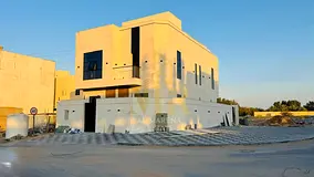 Corner villa for sale in Al Helio area, Ajman. Modern design, ground floor, first floor, and roof (5