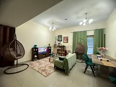 2BR Apartment | Dana Tower JVC | Balcony | Pool &amp; Downtown View