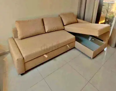 IKEA L shap Sofa store cum bed you can fix the storage lift or Right any