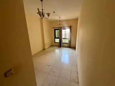 Apartment for rent in Emirates City - Two bedrooms - Spacious living room - Two bathrooms - Practical kitchen - Balcony overlooking the garden and Moh