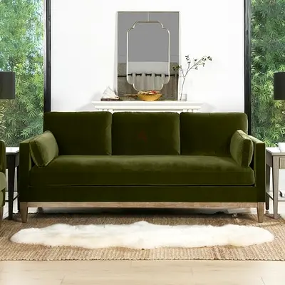 Green velvet upholstered 3 seater sofa