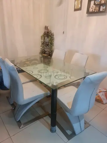 6 chairs, glass dining table,  only for Aed.200