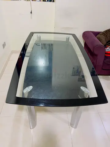 Rectangular glass table with metal legs - good used condition