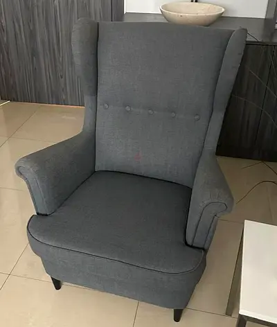 Grey fabric wingback armchair - good condition