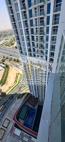 Miracle Garden View | Lavish 1BR | Modern Amenities | Big Swimming Pool | Prime Location