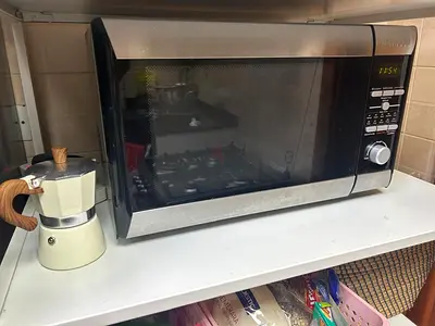 Kenwood 3 in one microwave,convection oven and grill