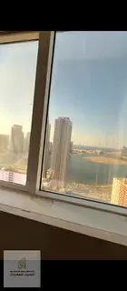 For sale: Two-bedroom apartment with a living room in Al Taawun, overlooking Al Khan Beach, with a d