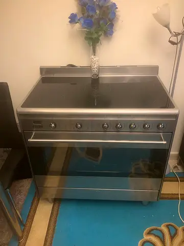 My stainless-steel electric range with ceramic glass hob and oven