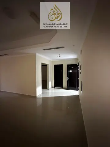 A one-bedroom apartment with a living hall is available for annual rent in Al Rashidiya 1, ideally located opposite Nesto Hypermarket and close to all