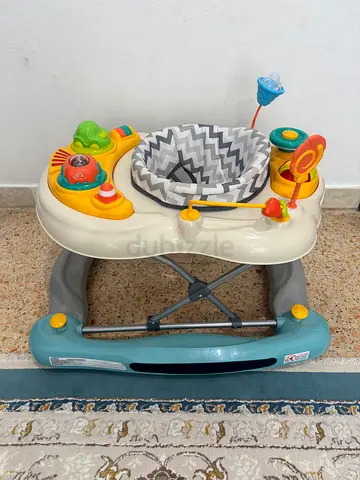 Baby walker with padded seat and activity tray