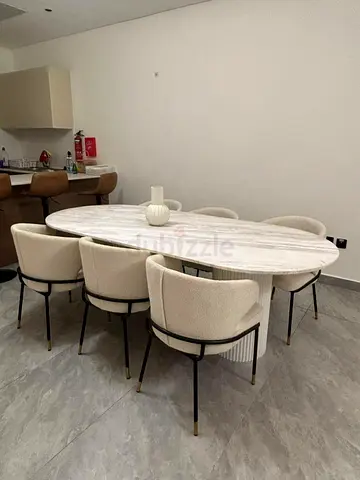 oval marble dining table