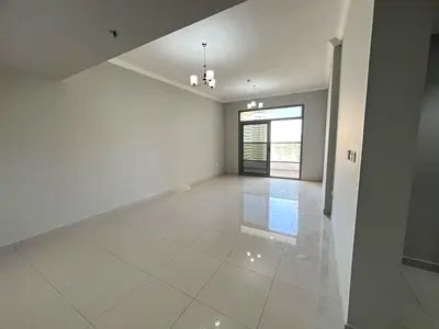 Free parking, second tenant, two bedrooms and a living room with built-in wardrobes, large balcony, open view, for annual rent in Al Khan, Sharjah