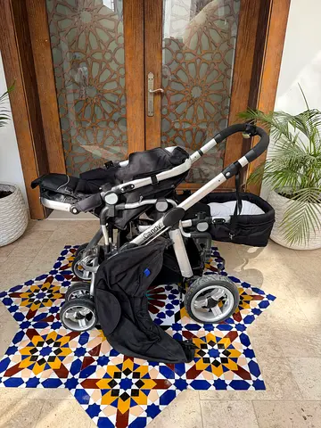 Tandem double stroller (pram) - good condition and holds two