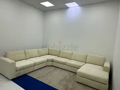Home centre beige color Ushape sofa