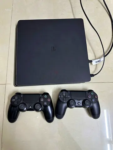 PS4 Slim | Sony PlayStation 4 Slim Console with 2 Controllers and 9 Games