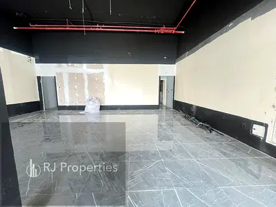 VERY PRIME LOCATION LUXURY SHOP WITH WASHROOM HIGH VISIBILITY WITH MEZZANINE FLOOR MAN ROAD FRONT JUST 140K