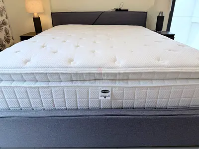Upholstered grey bed frame with mattress, gently used