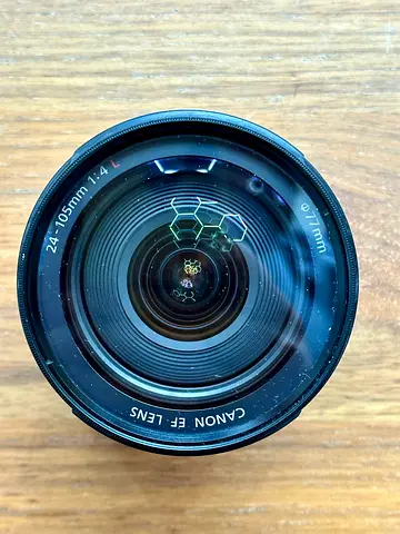 Canon EF 24-105mm f/4 L Standard Zoom Lens (77mm) - if fair condition.selling with the UV filter.