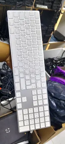 Slim white Bluetooth-style keyboard with numeric keypad - used