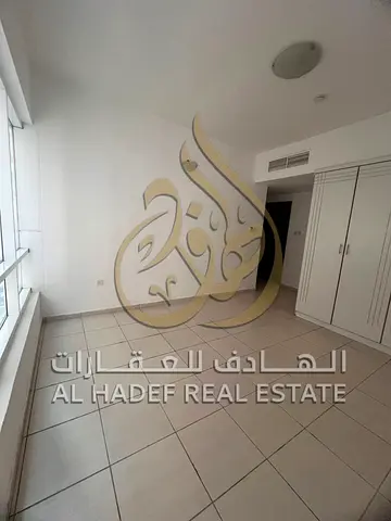 Elegant 1BR Family Apartment in a Secure Al Taawun Tower
