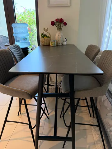 Gray bar height table and chairs