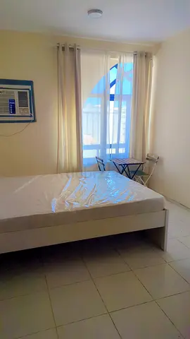 Master room with attached bath in Al Raffa for couple and girls