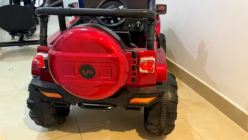 red kids ride-on jeep - good condition