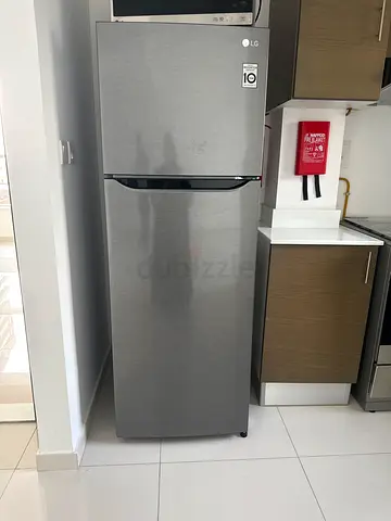 LG Silver Refrigerator with Top Freezer - Used, Good Condition