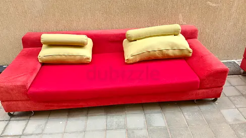 Red 3-seater sofa with cushions - good condition