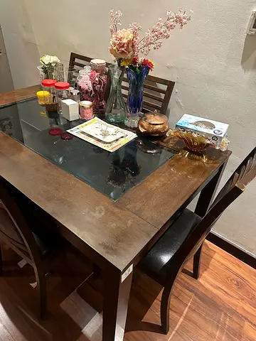 Wooden dining table with glass inset and 6 chairs