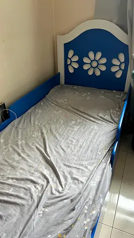 My childs blue floral toddler bed - used
