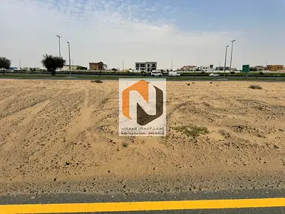 للبيع أرض تجارية على شارع مليحة الرئيسي – الطي شرق – الشارقة