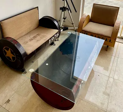 Vintage Industrial Style Coffee Table with Barrel Chairs