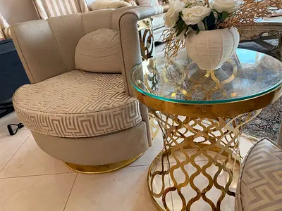 Elegant Round Chair with Gold Accent Side Table