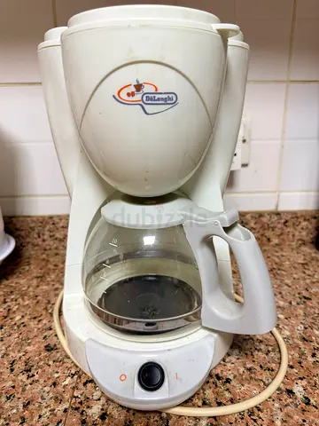 Used white drip coffee maker with glass carafe - working