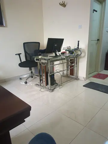 Used desktop PC with monitor and glass computer desk — complete setup