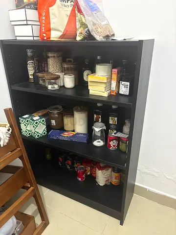 Small black 3-shelf bookcase — used as pantry, good condition