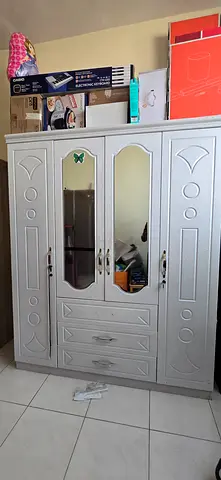 My white 4-door mirrored wardrobe with drawers
