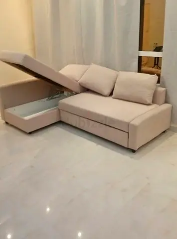 Ikea L Shape Sofa cum bed with big storage in L