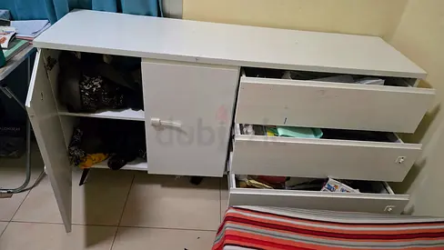 White storage cabinet with 3 drawers and cupboard