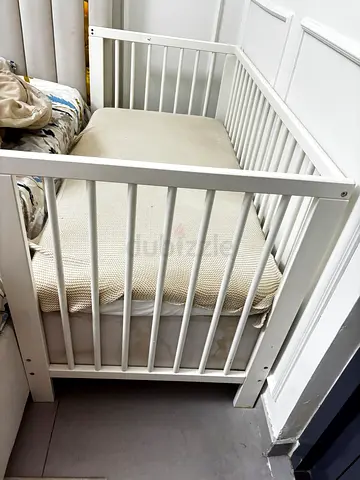 White wooden baby crib - used, sturdy